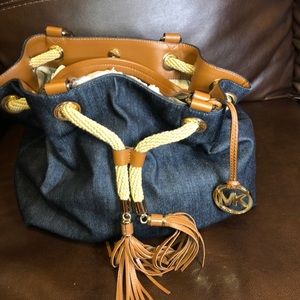 Michel Kors denim purse with brown trimming